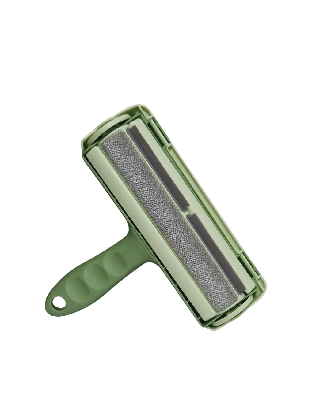 Choix de l'expert : gros plan sur la brosse Animours verte, montrant le rouleau en fibre de nylon haute densité pour un nettoyage pro.